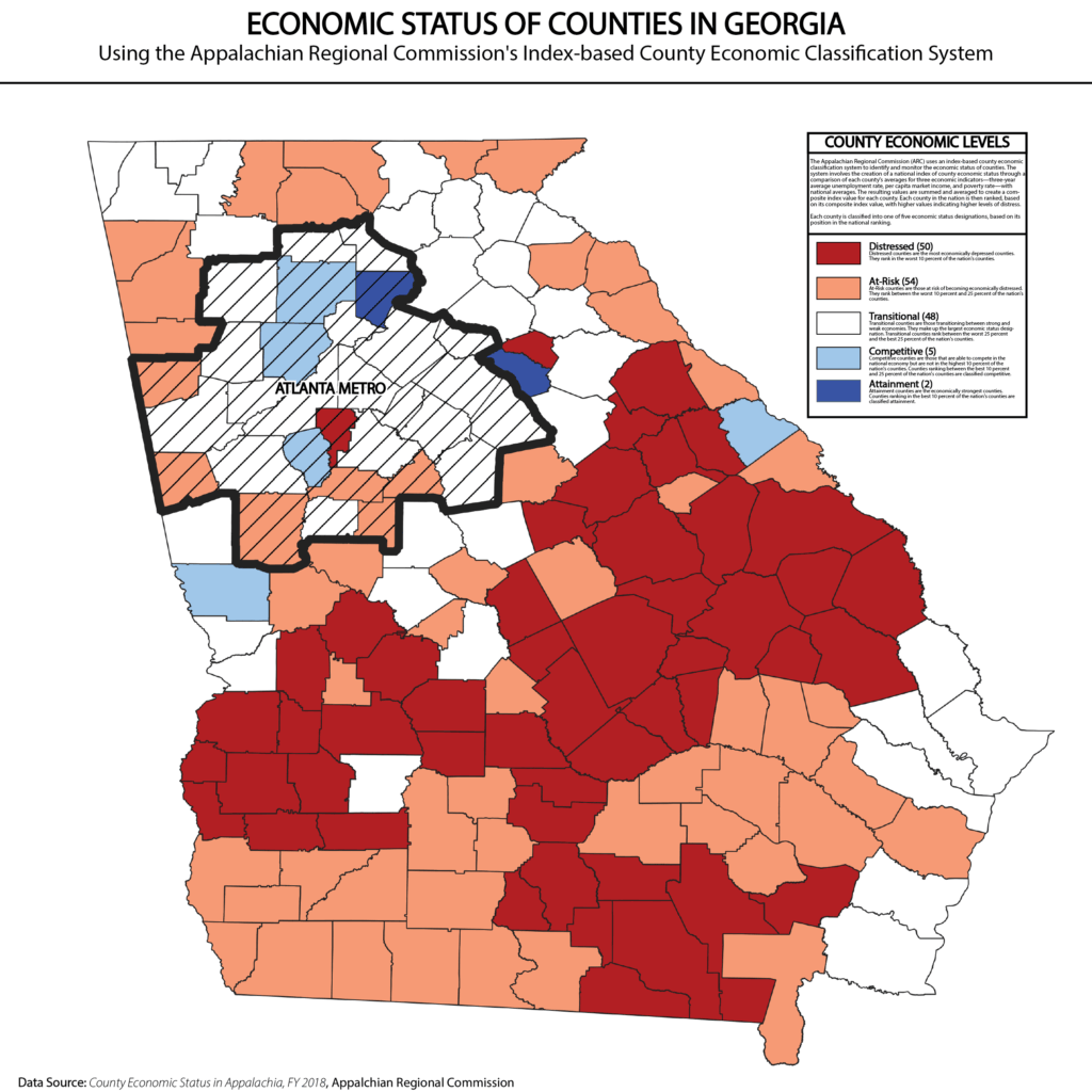 Close up of someone using a pen to highlight a county boundary on a map